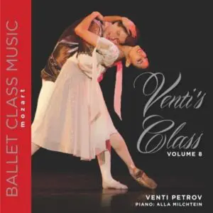 Ballet dancers performing a graceful pose in a classical style.