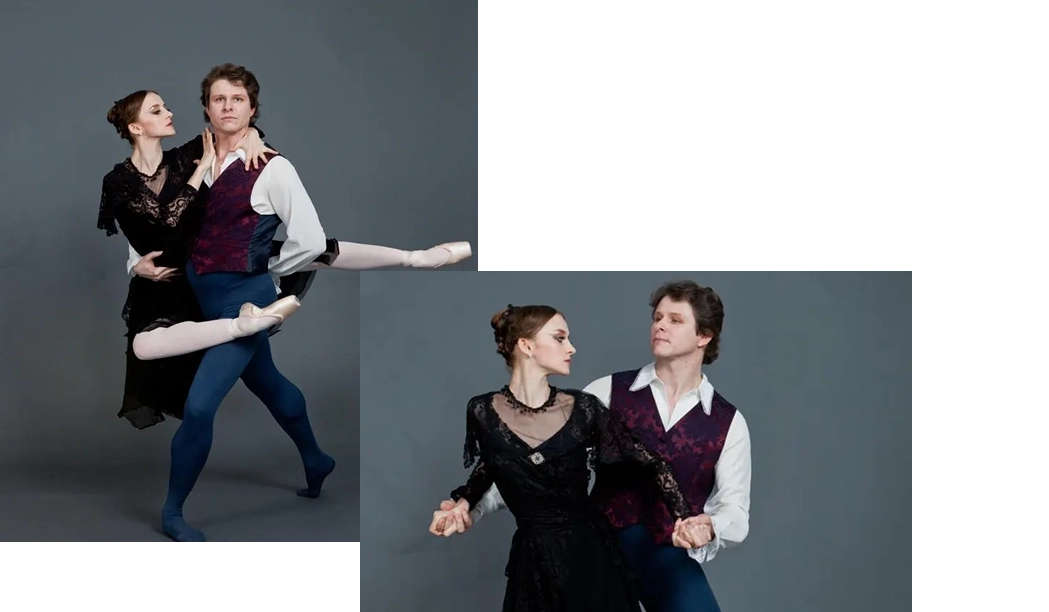 Two ballet dancers performing a graceful duet on stage.